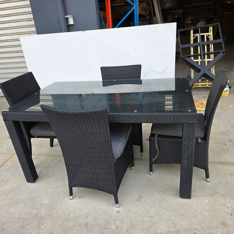 Stanley Wicker Table with armless chairs