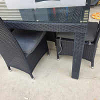 Stanley Wicker Table with armless chairs