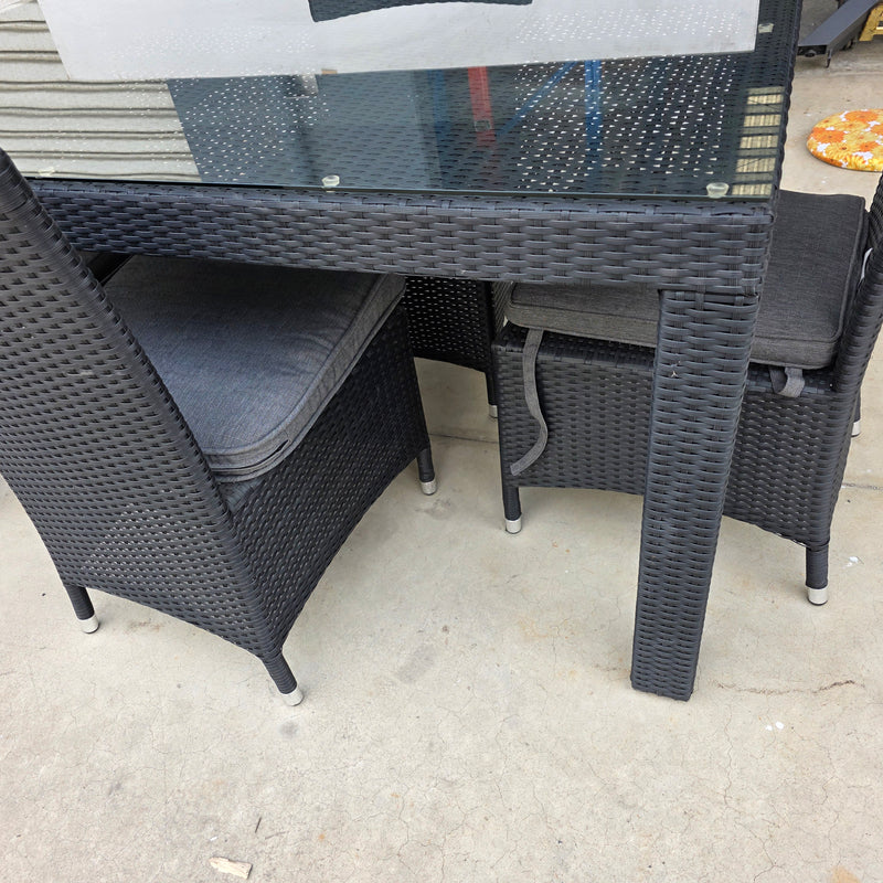 Stanley Wicker Table with armless chairs