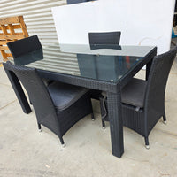 Stanley Wicker Table with armless chairs